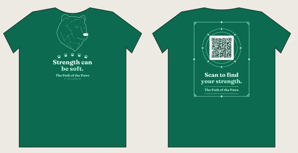 Emerald green The Path of the Paws shirt with a line art bear head and paw prints, slogan Strength can be soft